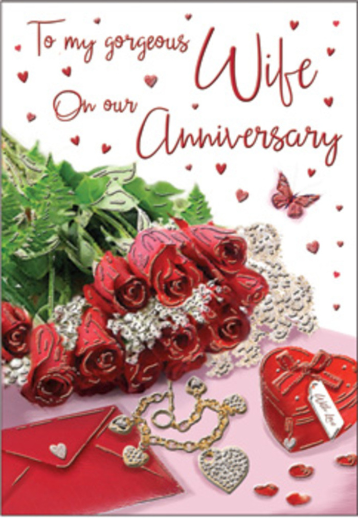 This evocative anniversary card image feels like a carefully curated memory box laid open on a Cricklewood dresser, each element placed to honour a love that has deepened over the years. At the centre, a bouquet of classic red roses stands proudly, their blooms fully open and luxuriously full, wrapped in a subtle, elegant surround that hints at the care with which they were chosen. The petals, rich and velvety, move from deep crimson at the core to slightly lighter edges, like the gentle fade of evening light over nearby Dollis Hill. Fresh greenery weaves among the roses, lending height, texture, and a whisper of garden freshness. Around this floral heart, delicate accents appear: a fine piece of jewellery glints in warm metallic tones, its chain gracefully coiled, while a vivid red gift box suggests a treasured present waiting to be opened. Soft lace, delicate heart motifs, and tiny scattered trinkets bring layers of texture, from smooth satin ribbon to the faint sheen of polished metal. An elegantly scripted message, partially visible, drifts across the card's surface, its flowing lines echoing the curves of the petals and the contours of the hearts. The lighting is warm and caressing, casting gentle shadows that give the scene depth without losing its softness, much like the cosy glow of a Cricklewood home on a winter evening. Everything here-a hint of velvet, a flicker of gold, a trace of silk-contributes to an atmosphere of profound romance, making this design an unforgettable tribute to enduring partnerships and meaningful anniversaries.